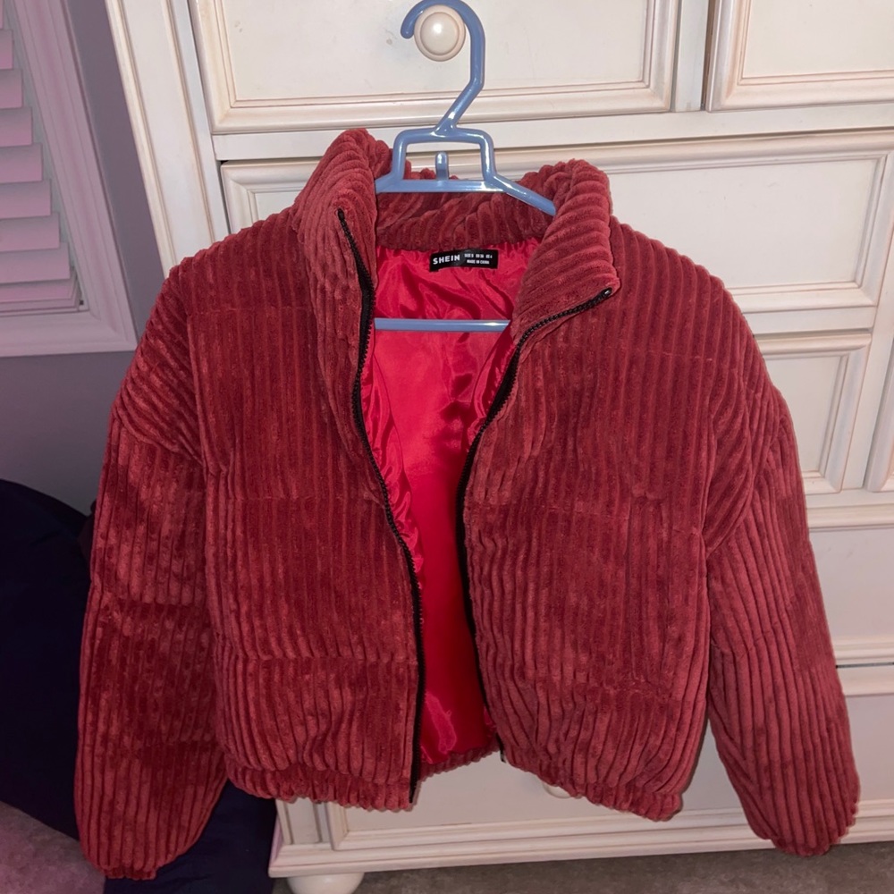 Red puffer jacket